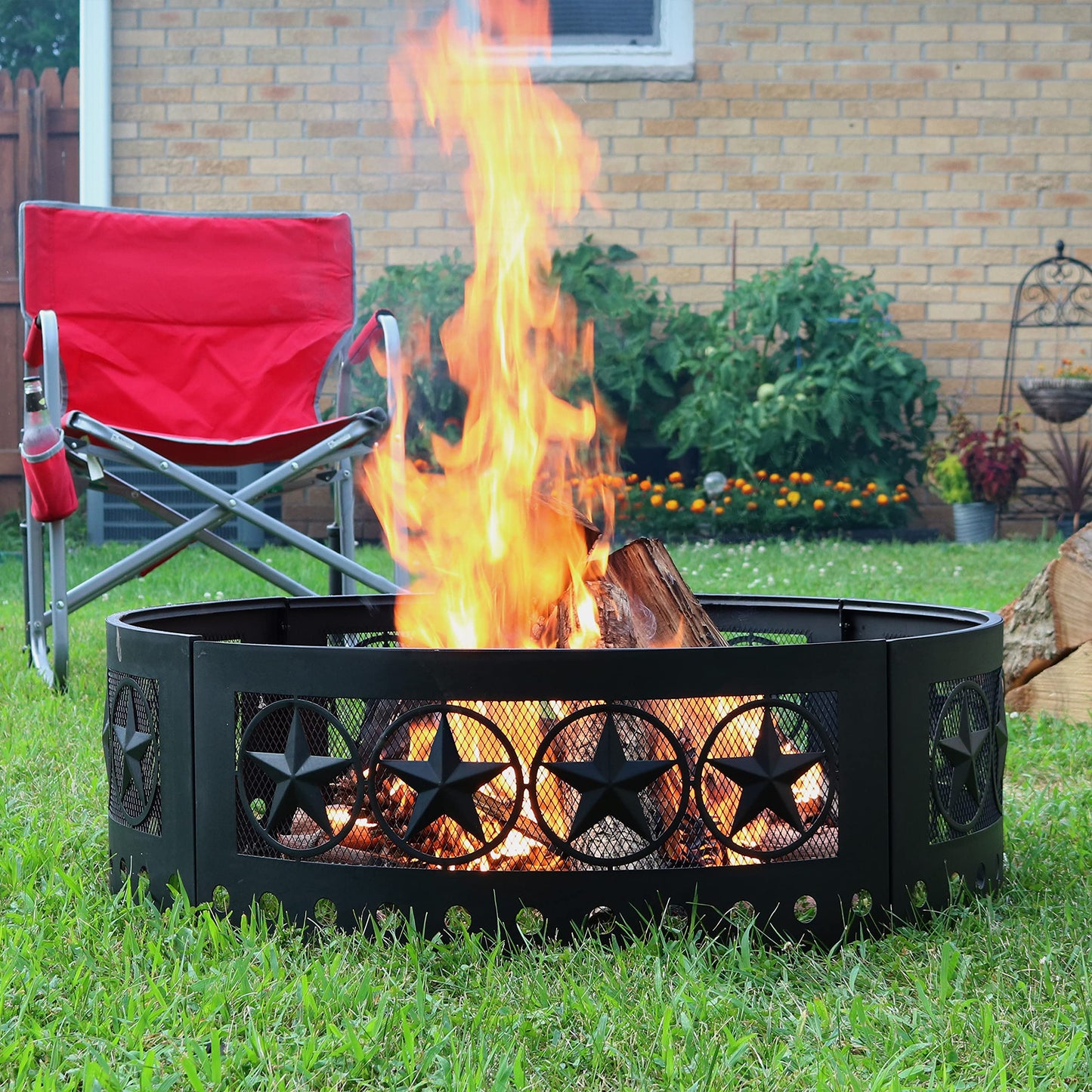 Sunnydaze 36-Inch Outdoor Fire Pit Ring with Poker - Round Heavy-Duty Steel Fire Ring for Camping or Backyard - 4-Star - 12" H