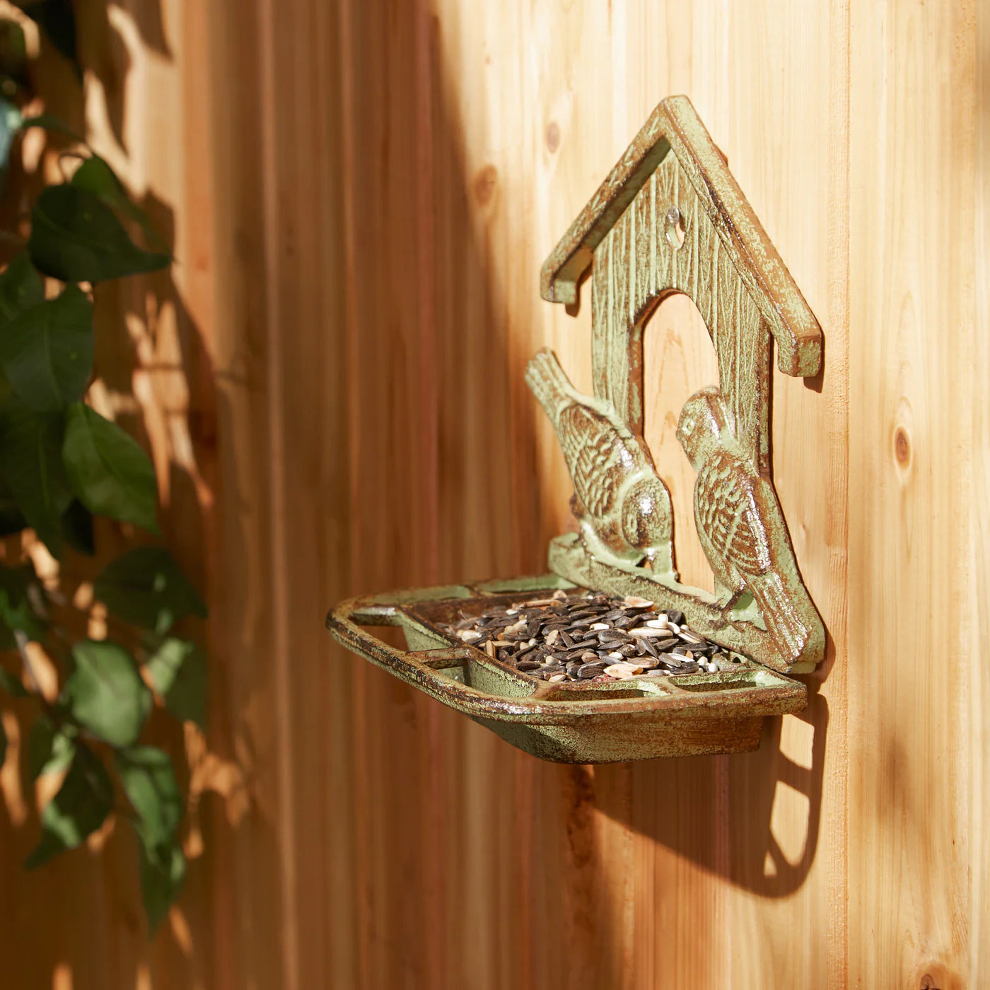 WALL MOUNTED CAST IRON BIRD FEEDER